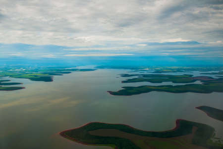 Manaus, Amazonas, Brazil, South America: Top view of the river. Beautiful landscape from the window of the airplane.の写真素材