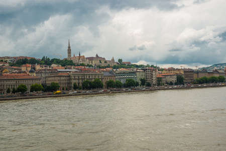 Budapest, Hungary, Europe: Church of St. Matthias, Fisherman's Bastion, Calvinist Church. Beautiful landscape with a bridge on the Danube river and old buildings of the old town.の写真素材
