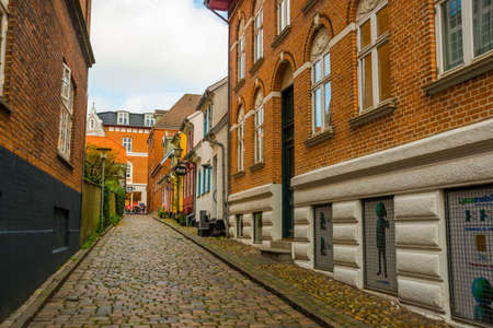 Aalborg, Denmark: Charming quiant streets with colorful traditional danish houses in historic Aalborg old town Aalborg, Denmarkの写真素材