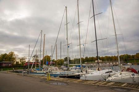 COPENHAGEN, DENMARK: Luxury speedboats docked along side of wooden promenade at Danish capital of...