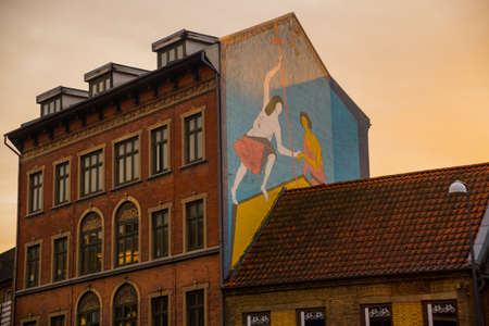 Odense, Denmark: Graffiti on the wall of the house. Beautiful traditional houses on the street in Odense is the city birthplace of Hans Christian Andersen, Denmarkの写真素材
