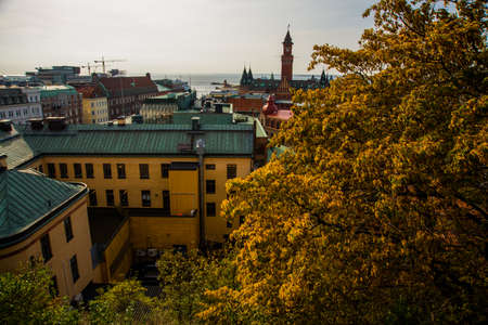 Helsinborg, Sweden: View of the city centre and the port of Helsingborg in Sweden. The ship is moored in port in Helsingborg harbour.の写真素材
