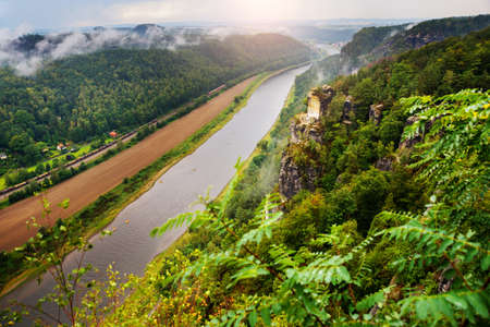 View over the Elbtal and the Elbe from the Bastei in the Saxon Switzerland, Germany, near Dresden and Rathenの写真素材
