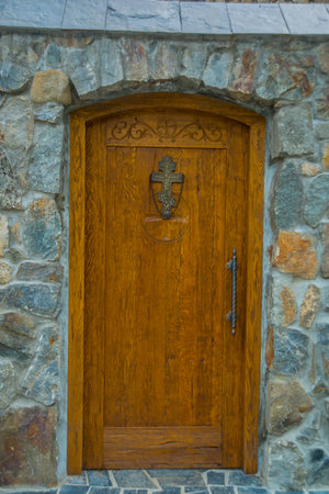 CAUCASUS, NORTH OSSETIA, ALANIA, RUSSIA - JUNE 27, 2015: the door of the monastery Alan Svyato-Uspensky monastery in Hidixysのeditorial素材