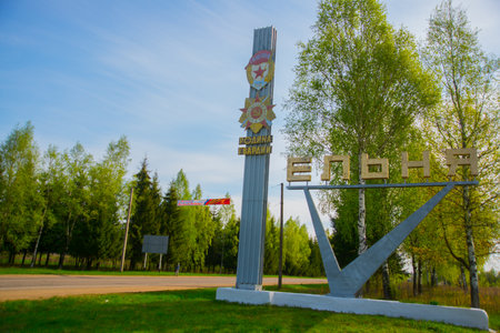 YELNYA, SMOLENSK OBLAST, RUSSIA - MAY 9, 2015: a sign with the name of the city before entering the city of Yelnya in the Smolensk regionのeditorial素材
