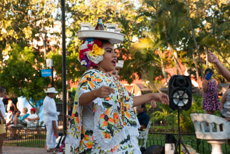 VALLADOLID, MEXICO, YUCATAN: men and women in traditional costumes dance for touristsのeditorial素材