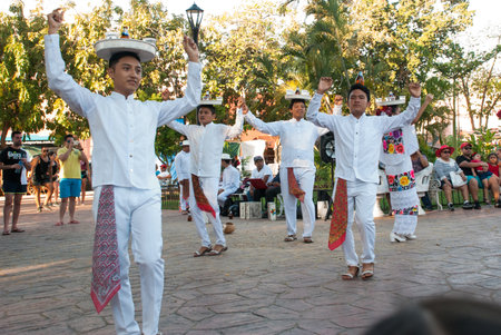 VALLADOLID, MEXICO, YUCATAN: men and women in traditional costumes dance for touristsのeditorial素材
