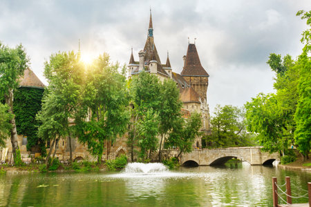 BUDAPEST, HUNGARY - MAY 2019: Beautiful landscape with a pond and an old Vajdahunyad castle. It's earn this title from being an inspiration for dracular's castle in the novel.のeditorial素材