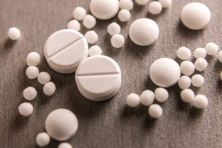 Different white tablets are found on the surface. Tools needed for the virus.の写真素材