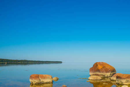 Huge beautiful stones on the beach of the Gulf of Finland. Saint Petersburg, Russia.の写真素材