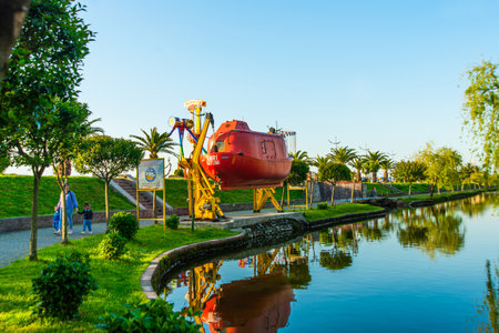 BATUMI, GEORGIA: The red boat is ready to launch on the Ardagani lake in summer in Batumi, Adjara region of Georgia.のeditorial素材
