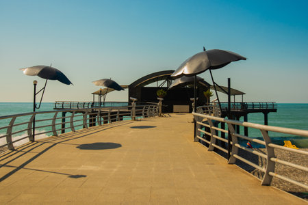 BATUMI, GEORGIA: Pier on the beach on the coast in Batumi, Adjara region of Georgia.のeditorial素材