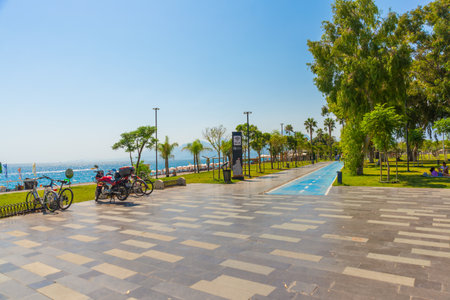 ANTALYA, TURKEY: Beautiful Trees and roads on the territory of Konyaalti beach in sunny summer in Antalya, Turkey.のeditorial素材