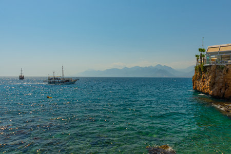 ANTALYA, TURKEY: The ship delivers tourists from the port of Antalya for a trip around the coastline on a sunny summer day, Turkey.のeditorial素材
