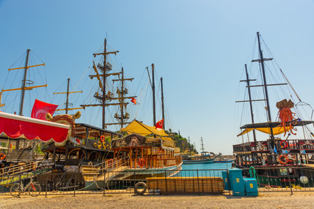 ANTALYA, TURKEY: Pleasure craft sailing ship decorated as a pirate, on a background of blue sky and sea. The ship delivers tourists from the port of Antalya for a trip around the coastline.のeditorial素材