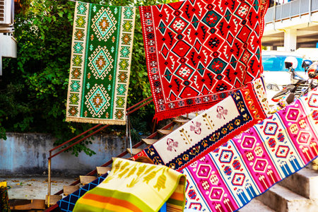 ANTALYA, TURKEY: Sale of traditional Turkish carpets on the street in the historical part of the city of Antalya, Turkey. Old town of Antalya is a Hpopular destination among tourists.のeditorial素材