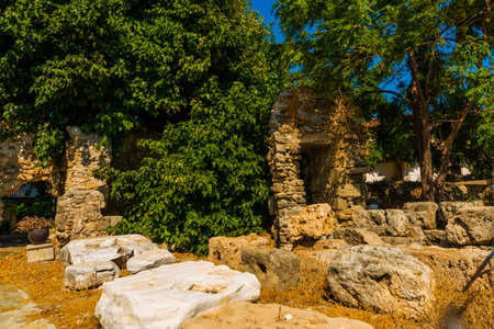 SIDE, TURKEY: Ancient ruins in the city of Side on a sunny summer day against the background of the blue sky. Side, Antalya province, Turkey.のeditorial素材