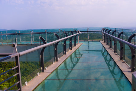 SATAPLIA, KUTAISI, IMERETI, GEORGIA: View to glass bottomed observation platform with clear floor at highest point of state Sataplia reserve with wonderful view of Kutaisi and Its surroundings.のeditorial素材