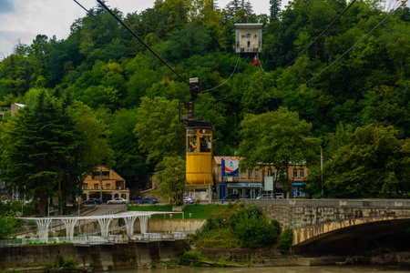 KUTAISI, GEORGIA: Beautiful landscape with a view of the Cable car across the Rioni River in Kutaisi on a sunny summer day.のeditorial素材