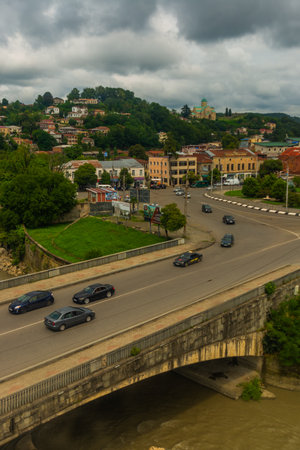 KUTAISI, GEORGIA: Beautiful Top view from the cable car of the Rioni River and the Shota Rustaveli Bridge in Kutaisi on a summer day.のeditorial素材