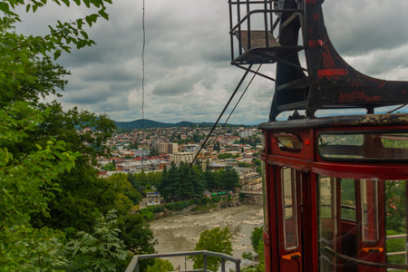 KUTAISI, GEORGIA: Beautiful landscape with a view of the Cable car across the Rioni River in Kutaisi...