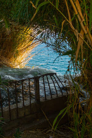 ANTALYA, TURKEY: Beautiful landscape with a picturesque view of Waterfall Duden on an evening summer...