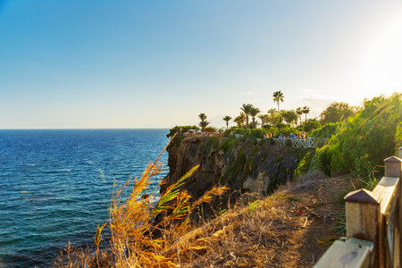ANTALYA, TURKEY: Beautiful park and cliff slope at Waterfall Duden on a summer evening day in Antalya.の写真素材