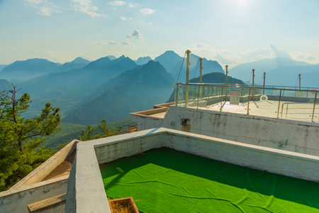 ANTALYA, TURKEY: Cable car on Mount Tyunektepe on a sunny summer day. There are observation decks at the top. The upper station is built at an altitude of 605 m.のeditorial素材