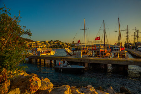 BODRUM, MUGLA, TURKEY: Beautiful romantic seascape with a view of ships and boats in the evening at sunset in Bodrumのeditorial素材