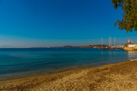 BODRUM, MUGLA, TURKEY: Beautiful seascape with a view of the ship and the mountains on the horizon in Bodrum on a sunny dayのeditorial素材