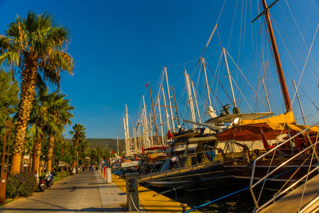 BODRUM, MUGLA, TURKEY: Luxury yachts marina at Bodrum, Marine tourist attractions in Bodrum. A colorful seascape with blue water and beautiful authentic yachts and sailing ships.のeditorial素材