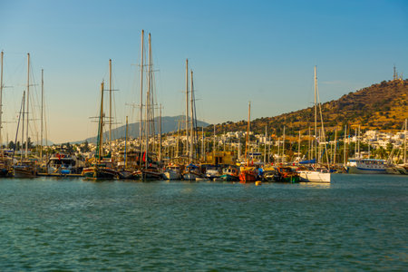 BODRUM, MUGLA, TURKEY: Luxury yachts marina at Bodrum, Marine tourist attractions in Bodrum. A colorful seascape with blue water and beautiful authentic yachts and sailing ships.のeditorial素材