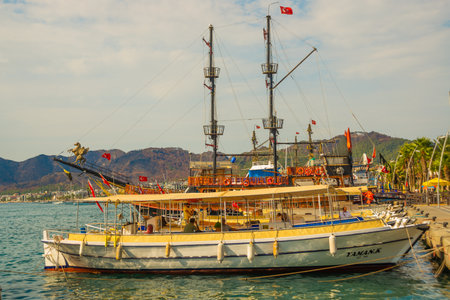 MARMARIS, MUGLA, TURKEY: Berth with luxury yachts and beautiful ships in Marmaris on a cloudy day.のeditorial素材