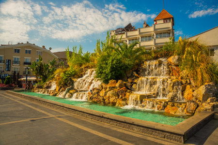 MARMARIS, MUGLA, TURKEY: Beautiful Artificial waterfalls in the center of Marmaris with turquoise water on a sunny day.のeditorial素材