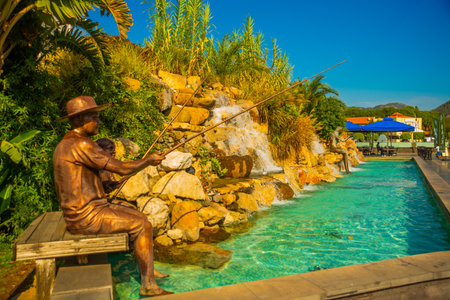 MARMARIS, MUGLA, TURKEY: Beautiful Artificial waterfalls in the center of Marmaris with turquoise water on a sunny day.のeditorial素材