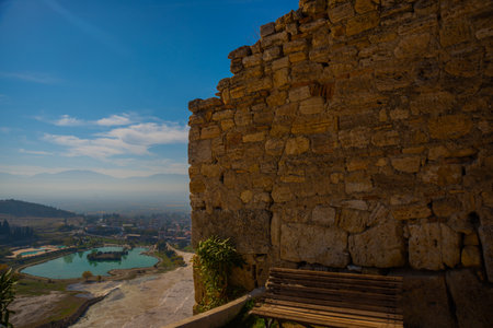PAMUKKALE, DENIZLI, TURKEY: Ruins of the ruined city of Hierapolis in Pamukkale on a sunny day.のeditorial素材