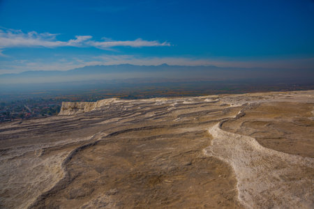PAMUKKALE, DENIZLI, TURKEY: Beautiful landscape with panoramic views of the white travertine and the mountains on a sunny day.のeditorial素材