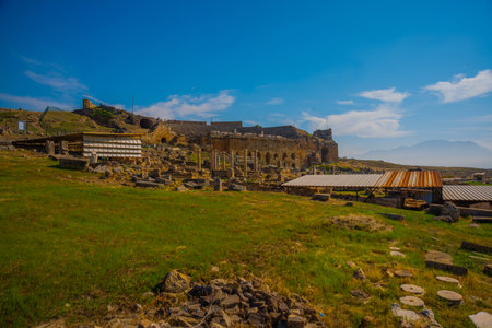 PAMUKKALE, DENIZLI, TURKEY: View of the Pamukkale Amphitheater, the ruined city of Hierapolis.のeditorial素材