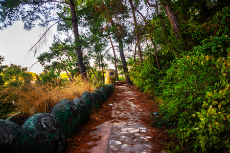 CAMYUVA, KEMER, TURKEY: Caterpillar sculpture in the park near the destroyed hotel Holiday Area Eco Dream Club Sea Resort in the village of Camyuva.のeditorial素材