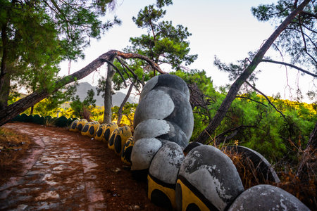 CAMYUVA, KEMER, TURKEY: Caterpillar sculpture in the park near the destroyed hotel Holiday Area Eco...