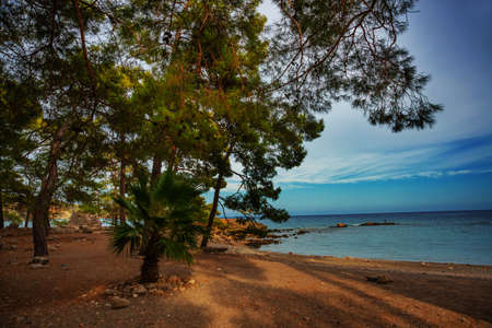 PHASELIS, TURKEY: The scenic view of the beach of Phaselis ancient city on a cloudy day in the...