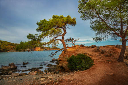 PHASELIS, TURKEY: The scenic view of the beach of Phaselis ancient city on a cloudy day in the village of Tekirova, Antalya province, near Kemer, Turkey.の写真素材
