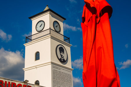 MARMARIS, MUGLA, TURKEY: The main building with a Tower in the city center on the Youth Square on May 19 in Marmaris against the background of blue sky and clouds.のeditorial素材