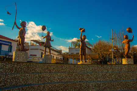 MARMARIS, MUGLA, TURKEY: Fountain with sculptures of Children in Marmaris. Statues of children playing.のeditorial素材
