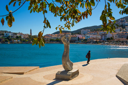 DATCA, MUGLA, TURKEY: View from the promenade on and the buildings sea in the town of Datca on a sunny day.のeditorial素材