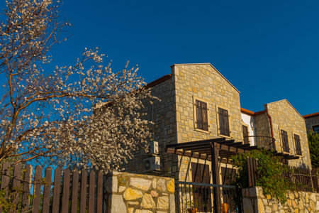 ESKI DATCA, MUGLA, TURKEY: View of Eski Datca street with old stone houses on a sunny day.のeditorial素材