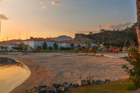 MARMARIS, MUGLA, TURKEY: Wooden gazebos on the beach at the Adventure Park or Macera in Marmaris in the evening.の写真素材
