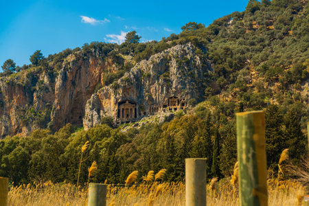 DALYAN, MUGLA, TURKEY: Rock-cut temple tombs of the ancient city Kaunos in Dalyan.のeditorial素材