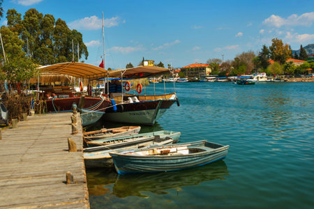 DALYAN, MUGLA, TURKEY: Landscape with a view of the river and the resort town of Dalyan.のeditorial素材