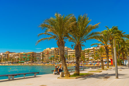 TORREVIEJA, SPAIN: The famous beach in Torrevieja on a sunny day in summer near Alicanteのeditorial素材
